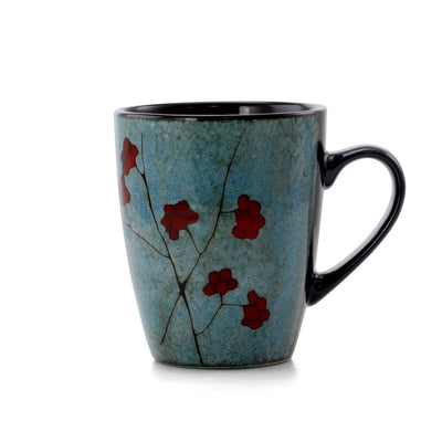 Elama Floral Accents 16 Piece Stoneware Dinnerware Set in Blue